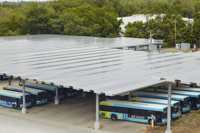 Electric buses with PV modules in garage