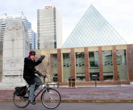 * Councillor Ben Henderson of Edmonton, Alberta. Henderson is a winter cyclist and is pictured outside of Edmonton’s city hall. Photo Duncan Kinney, Green Energy Futures