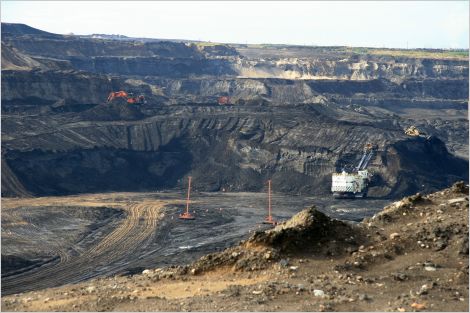 Oilsands mine with equipment