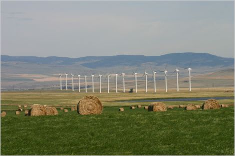 Wind turbines near mountains