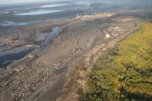 in situ oilsands development on the edge of boreal forest, natural habitat for caribou