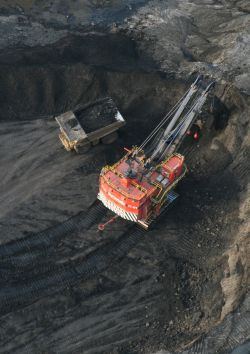 Machinery in an open pit mine in the oilsands.