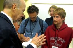 James Hansen meets with conference participants following his keynote address on carbon pricing. Photo: Julia Kilpatrick, the Pembina Institute. 