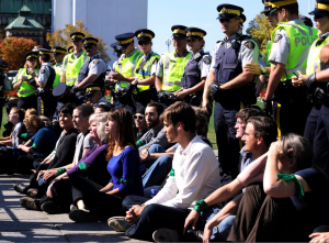 Canadians concerned about how oilsands expansion will affect Canada's climate commitments stage a sit-in on Parliament Hill. Photo: Greenpeace Canada.