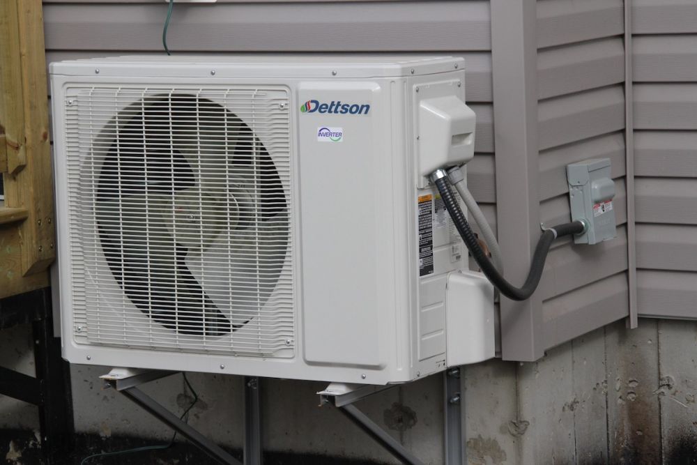 * Heat pump on residential building