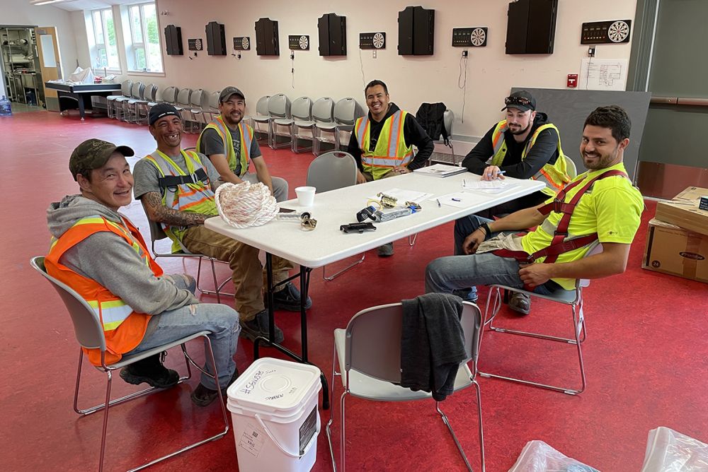Workers sitting around a table