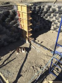 * The Earthship walls were made out of 800 tires and 12,000 cans.