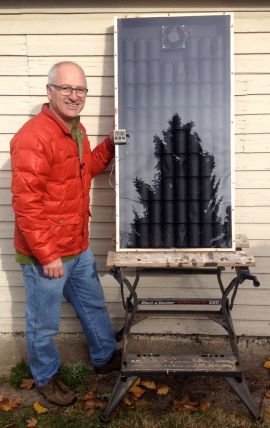 * This is our finished DIY solar air heater.  The outdoor temperature was 10˚ C  and even on a cloudy day with a little sun peaking through once in a while the heater warmed up pretty quickly. 