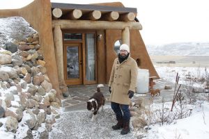 * Duncan Kinney outside his parent's Alberta prairie Earthship, a passive solar heated home on a -20 degree celsius day in the dead of winter. How does the Earthship work on a cold winter day on the Canadian prairie? Take the video tour: <a href="http://www.greenenergyfutures.ca/episode/earthship-revisited" rel="nofollow">www.greenenergyfutures.ca/episode/earthship-revisited</a> Photo David Dodge, GreenEnergyFutures.ca