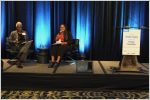 Heather Campbell and Calyssa Burke on stage at the Women in Alberta's Energy Transition event