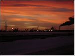 Oil production facility at dawn