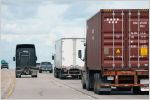 Semitrucks and passenger vehicles on the highway in Canada