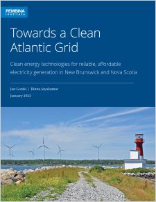 Report cover with title and subtitle. Cover photo is wind turbines along the water with a lighthouse nearby. 
