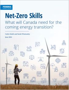 Net-zero skills cover - female engineer with wind turbines