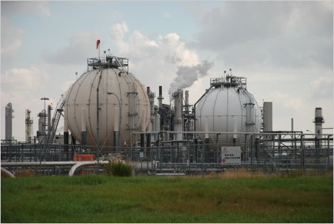 Cylindrical storage tanks at an oil and gas facility