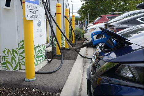 Electric vehicles at a charging station.