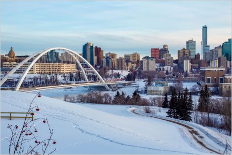 The downtown Edmonton skyline with bridge in winter