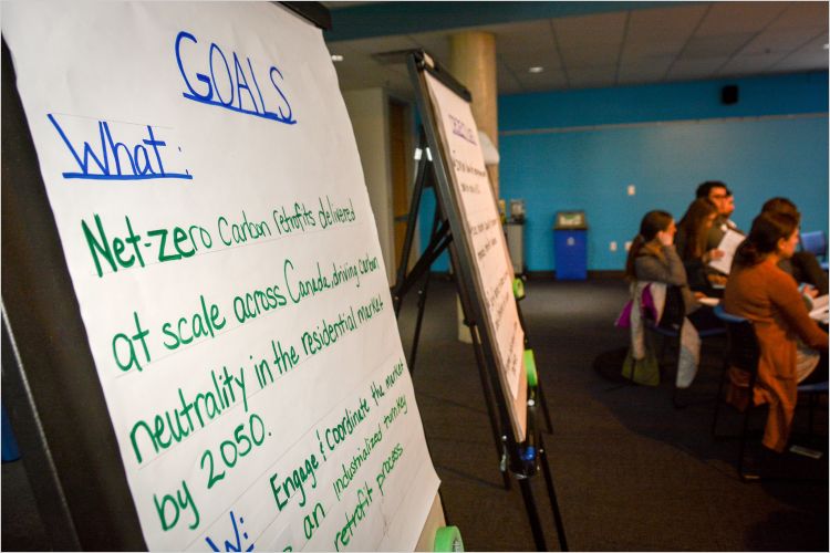 Workshop participants and flipchart