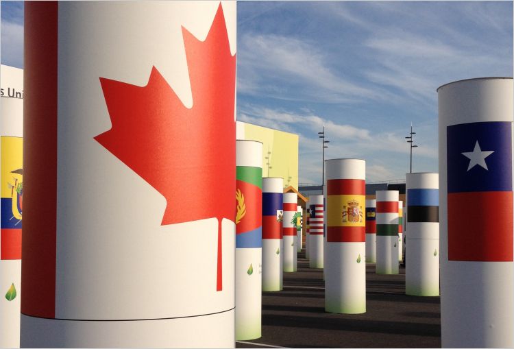 Canadian flag symbol in front of other other country images