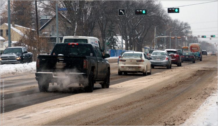 Vehicles on a snowy Canadian street