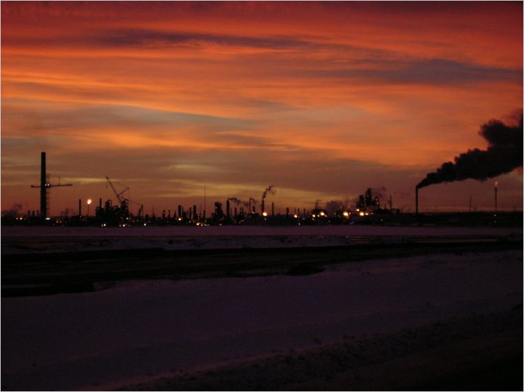 Oil production facility at dawn