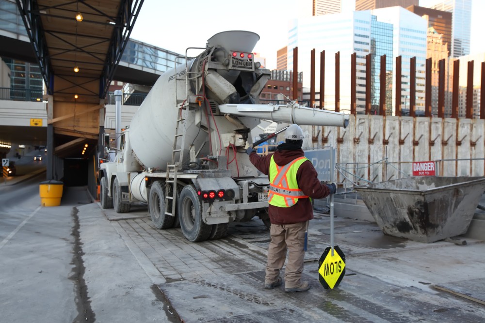 Construction site in Downtown Toronto directing traffic around the site