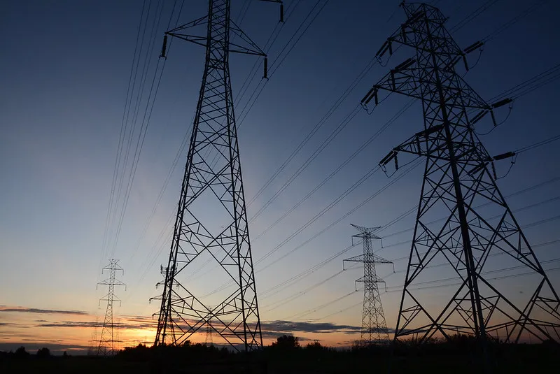 Electricity pylons at sunset