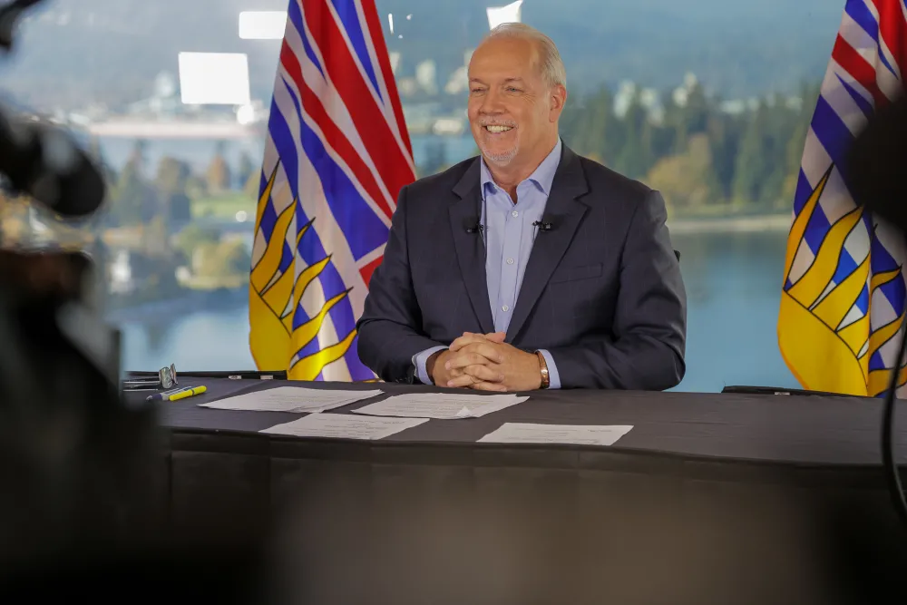 John Horgan at news conference