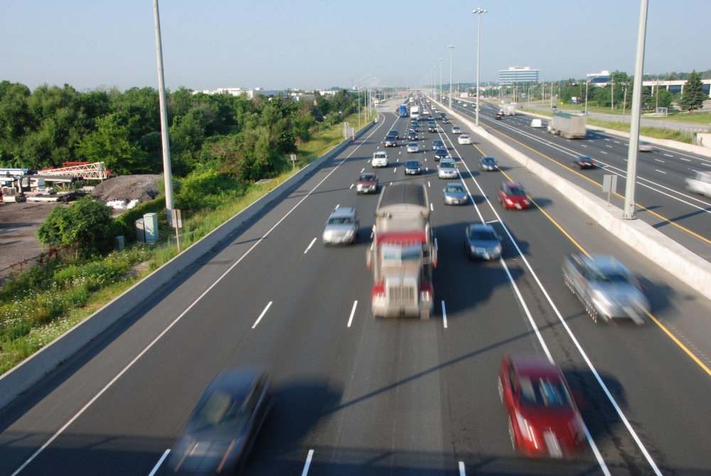 Semitrucks and passenger vehicles on the highway in Canada