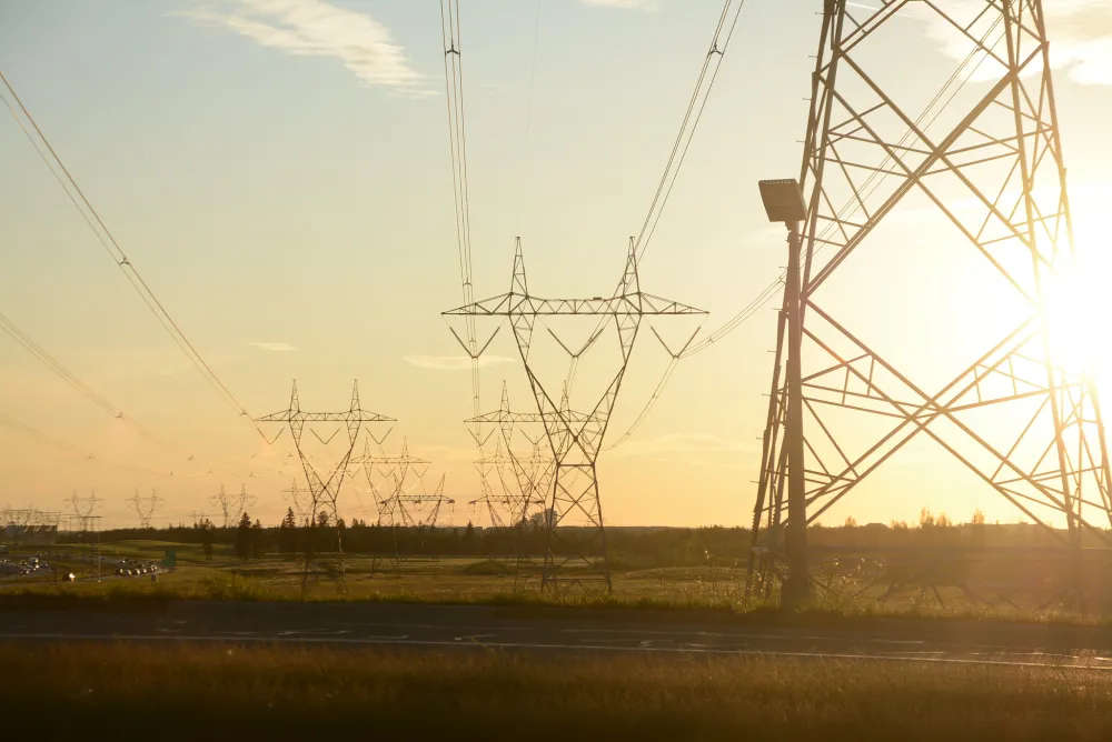 Sunset over electricity transmission lines