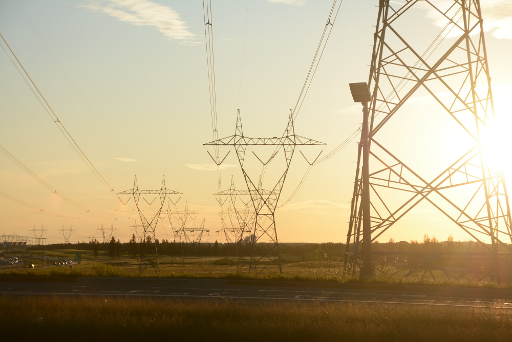 Sunset over electricity transmission lines