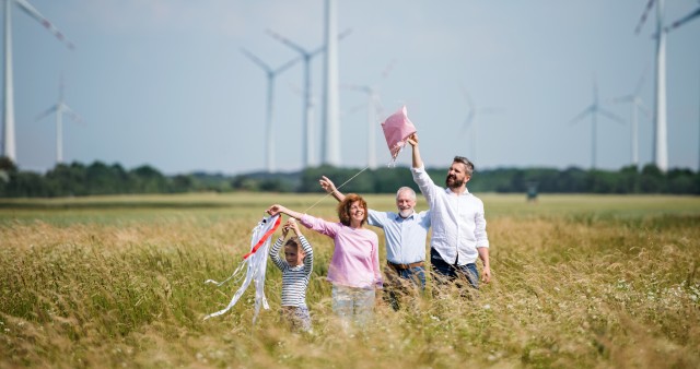 Intergenerational family celebrates renewable energy