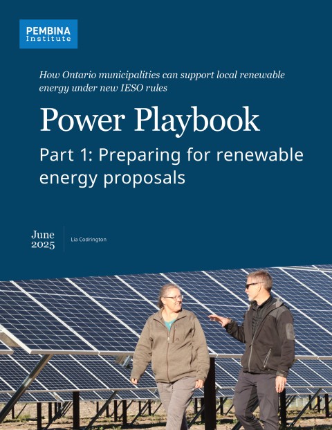 The front cover of the report, featuring a picture of two people walking in front of a solar farm