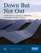 The report's front cover, featuring a photo of solar panels in a field at dusk. The picture is of the Innisfail solar project in Alberta.