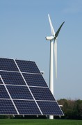 A solar panel and a wind turbine in a field in southwestern Ontario