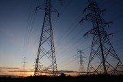Electricity pylons at sunset