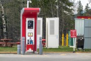 A red and grey Petro-Canada DC Fast electric vehicle charging station
